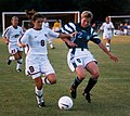 Image 27Mia Hamm (left) battles with German defender Kerstin Stegemann (from Women's association football)