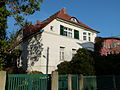 Villa mit Einfriedung