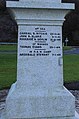 Inscription on one of the four sides of the memorial