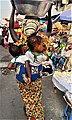 A woman selling water at Makola, Ghana