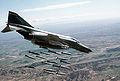 A U.S. Air Force McDonnell Douglas F-4E-61-MC Phantom II (s/n 74-1630) from the 81st Tactical Fighter Squadron, 52nd Tactical Wing, releasing 18 Mark 82 227 kg bombs over the Bardenas Reales Gunnery Range, Spain, on 25 March 1986