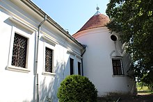 A round bastion of a larger building