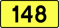 English: Sign of DW 148 with oficial font Drogowskaz and adequate dimensions.