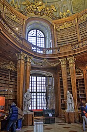 Stylized Baroque Corinthian columns in the Austrian National Library, Hofburg, Vienna, Austria, designed by Johann Bernhard Fischer von Erlach in c.1716–1720, built in 1723–1726[22]