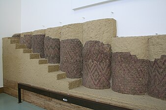 Columns with clay mosaic cones from the Eanna precinct in Uruk (southern Mesopotamia), Pergamon Museum, Berlin, Germany, unknown architect, 3600-3200 BC[28]