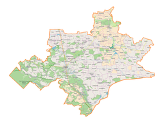 Mapa konturowa powiatu tomaszowskiego, blisko centrum na lewo znajduje się punkt z opisem „Radiowo-Telewizyjne Centrum Nadawcze Tarnawatka”