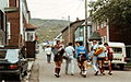 A group of footballers walking in the streets of Saint-Pierre (1984)