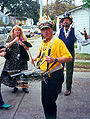 Drummer Louis Lederman playing a snare drum with cow-bells and small cymbals attached