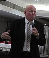 Wilf McGuinness talking to an audience