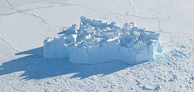 Iceberg in sea ice (8141455746).jpg