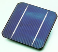 A solar cell made from a monocrystalline silicon wafer.