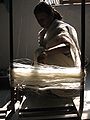 An Assamese woman preparing thread manually for weaving in Mekhela Chadors in the Mahila Samiti workshop in Tezpur