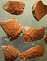 Samian ware sherds.