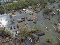 Helicopter view of devastated residential neighborhood, Port Sulphur