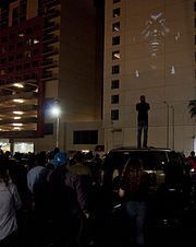 West's face shown on a projection across the W Hotel in Los Angeles