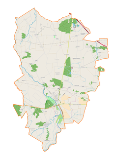 Mapa konturowa gminy Uniejów, blisko centrum po prawej na dole znajduje się punkt z opisem „Wola Przedmiejska”