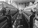 A little spinner in the Mollohan Mills, Newberry, South Carolina, 3 December 1908. Lewis W. Hine, public domain