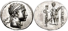 Silver coin of Euthydemus II. Reverse with standing Heracles holding club. Greek legend reads: ΒΑΣΙΛΕΩΣ ΕΥΘΥΔΗΜΟΥ, "Of King Euthydemus".