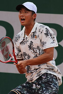 Zhang tijdens de kwalificaties van Roland Garros, 2019