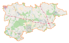 Mapa konturowa powiatu zgierskiego, w centrum znajduje się punkt z opisem „Kębliny”