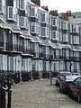 Houses on Royal Crescent, Brighton are entirely faced with black mathematical tiles Location on Google Maps