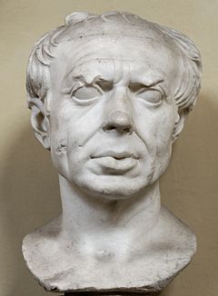 Scuplture of a man's head and a small part of his shoulders