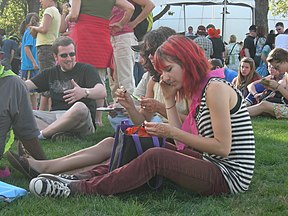 English: Sitting on the lawn during a fair