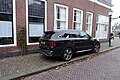 Kia Sorent in de Muntstraat in Hoorn. Auto staat op de stoep geparkeerd, dus fout