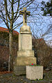 Wegekreuz zur Erinnerung an die alte Pfarrkirche St. Johann APL („vor dem lateinischen Tore“)