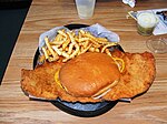 Pork tenderloin sandwich with French fries