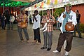 Musicians accompanying the dancers. Among the instruments used are the quijada and bote.