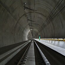 Interior view of the Ceneri rail tunnel, a concrete tube with one rail track.