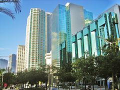 A glass and stucco skyscraper