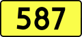 English: Sign of DW 587 with oficial font Drogowskaz and adequate dimensions.