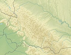 Mapa konturowa Beskidów Wschodnich, blisko centrum po prawej na dole znajduje się punkt z opisem „schronisko”