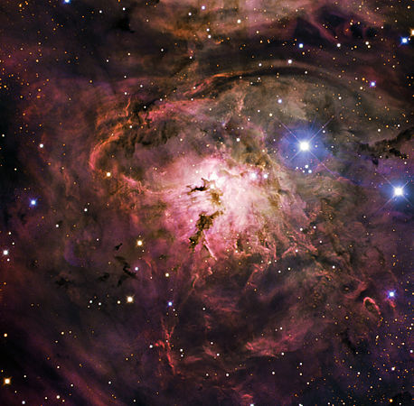 Gas and dust condense, beginning the process of creating new stars in this image of Messier 8, also known as the Lagoon Nebula. User:EricHS211 (centered by User:Lmbuga)