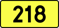 English: Sign of DW 218 with oficial font Drogowskaz and adequate dimensions.