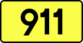 English: Sign of DW 911 with oficial font Drogowskaz and adequate dimensions.