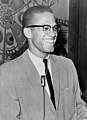 Image 13 Malcolm X Photo credit: Ed Ford, New York World-Telegram and Sun Malcolm X was an American Black Muslim minister and a spokesman for the Nation of Islam. Born Malcolm Little, he changed his surname to "X" as a rejection of his "slave name". Tensions between him and the Nation of Islam caused him to break from the group in 1964. He claimed to have received daily death threats and his house was burned to the ground in February 1965. One week later, Malcolm X was assassinated, having been shot in the chest by a sawed-off shotgun and 16 times with handguns. Three members of the Nation of Islam were convicted. More selected portraits