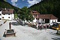 * Nomination Swiss mountain village of S'Charl with hikers boarding the last Postbus. --Dschwen 12:40, 7 August 2007 (UTC) * Promotion Good angle take much valuable object to the view, technicaly acceptable. --Beyond silence 23:17, 9 August 2007 (UTC)