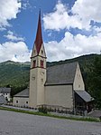 Pfarrkirche St. Peter und Paul mit Friedhofskapelle und Friedhof in Pens