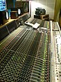 Image 15Neve VR60, a multitrack mixing console. Above the console are a range of studio monitor speakers. (from Recording studio)