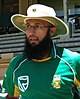 A portrait of a bearded man wearing a South African ODI uniform