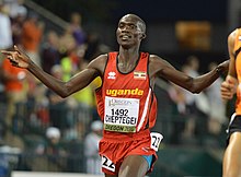 Muži - Joshua Cheptegei Uganda 26:11,00 min.