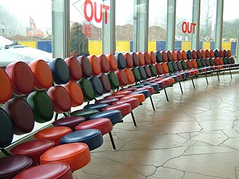 Mid-century modern - Marshmallow sofa, by Irving Harper for George Nelson Associates, 1956, metal frame with round discs of covered foam, unknown location[78]