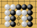 Image 16Example of seki (mutual life). Neither Black nor White can play on the marked points without reducing their own liberties for those groups to one (self-atari). (from Go (game))