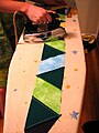 Pressing seam allowances flat with an iron before making final seams – Seams may be basted, tacked or pinned in place before final stitching is done.