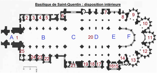 Plan représentant un long bâtiment en forme de croix de Lorraine vec des lettres bleues et des nombres verts apposés sur différentes parties de l'édifice.