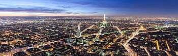 View over Paris, at dusk, from the top platform of the Montparnasse tower