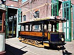 Elektrische motorwagen 2 (Gemeentetram Amsterdam 72) als replica teruggebracht in de uitvoering van 1904 in het Haags Openbaar Vervoer Museum.